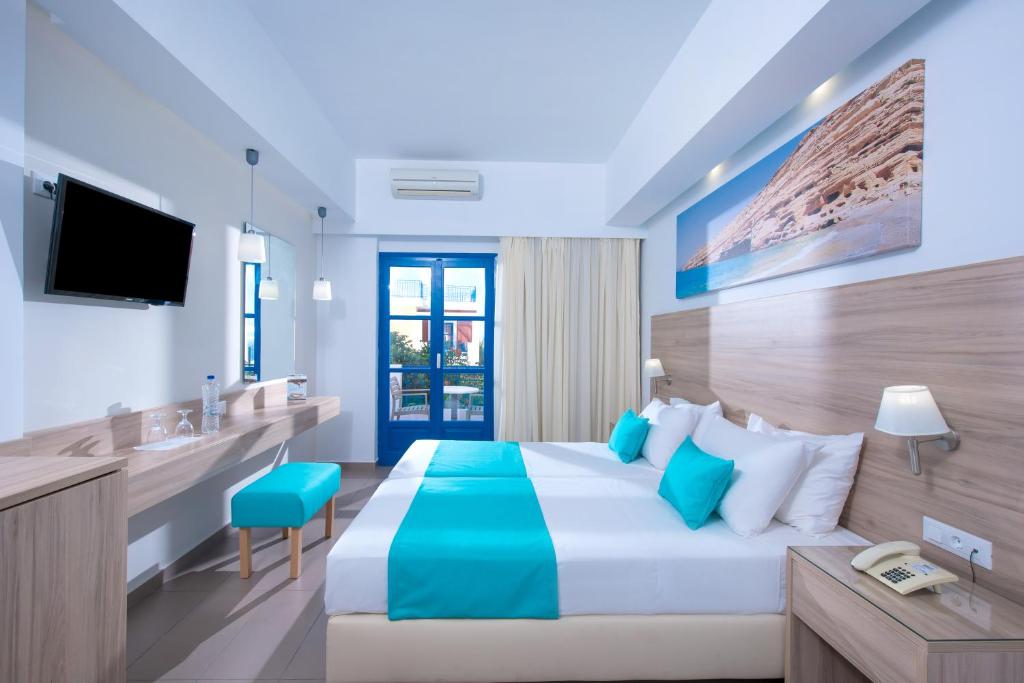 Astra Village Hotel & Suites